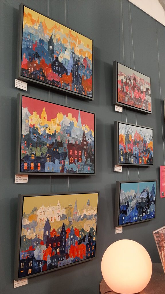 Original paintings by Ronnie Cruwys at Biggar Corn Exchange during Biggar Little Festival 2024